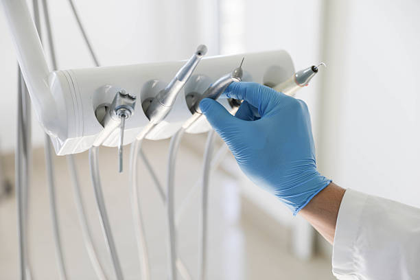 Professional Tooth Extraction technician working in Kingston, WA